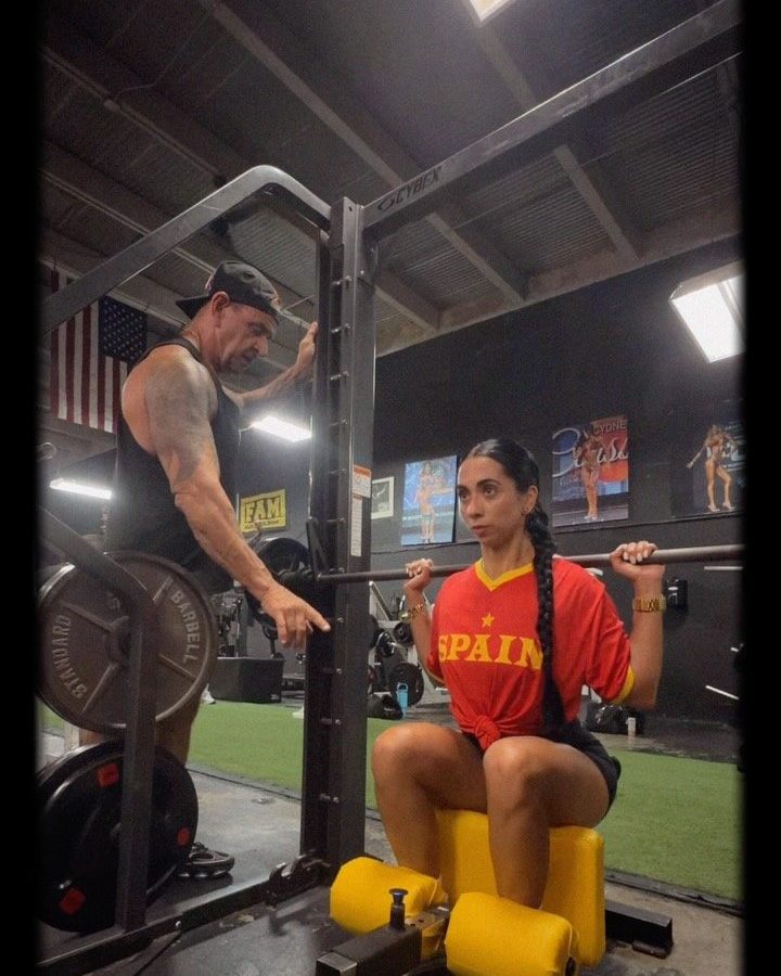 Jorge Gonzalez coaching a squat at Flexappeal Miami